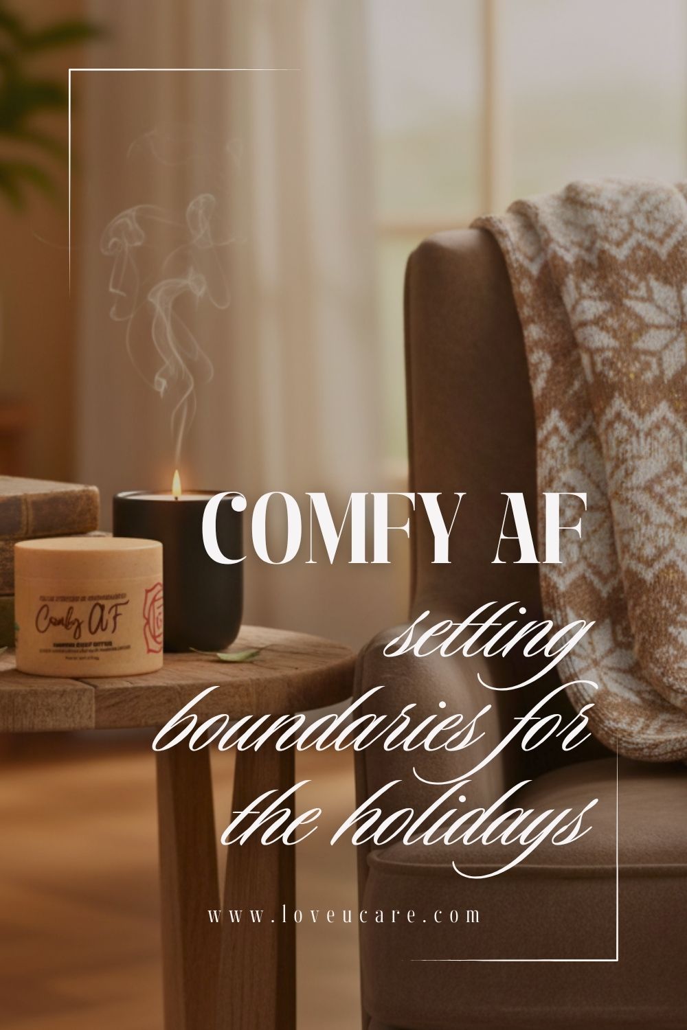 A candle lit on a table, surrounded by a cozy setting with a couch and pillows. 